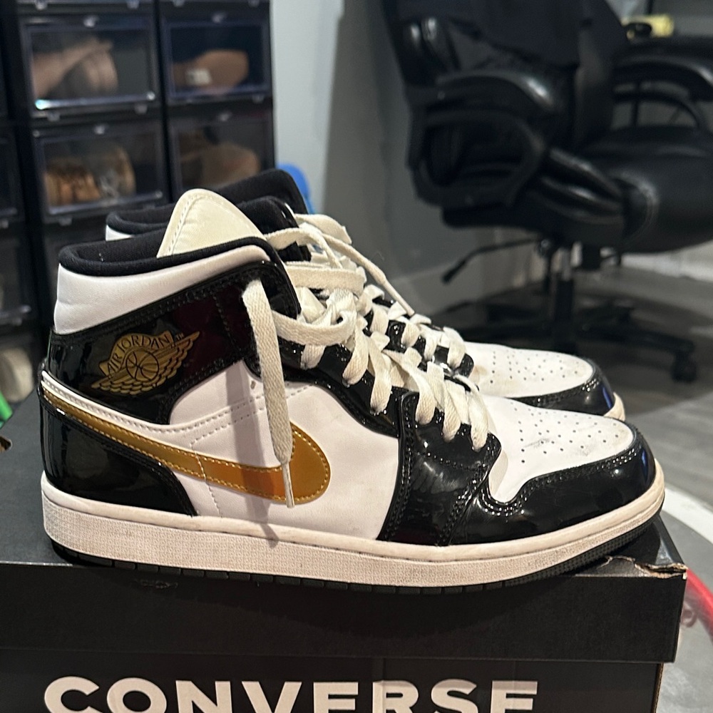 Jordan 1 mid Black and White Sneakers with Gold Accents